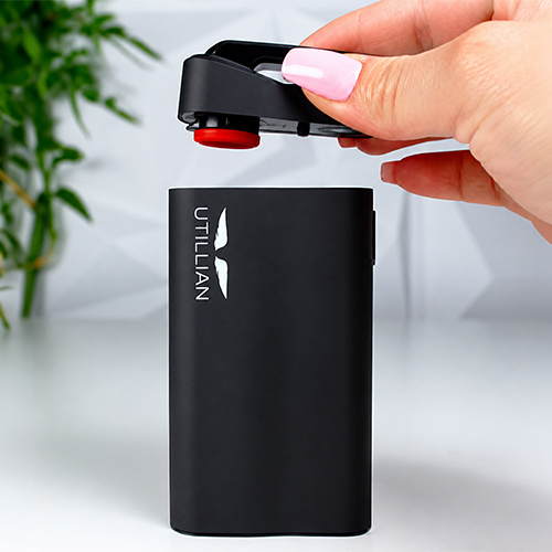 Inserting the mouthpiece on the Utillian 723 vaporizer.