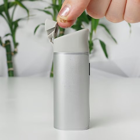 Yocan Black Pocket is on hand while a woman is attaching its extended mouthpiece.