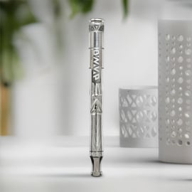 Steel-colored DynaVap UniDyn portable dry herb vaporizer, crafted with premium titanium and stainless steel, featuring an ergonomic design, efficient heat activation, and battery-free vaping for smooth, flavorful cannabis sessions. 