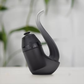 Puffco New Proxy vaporizer - smart portable dab pen with 3D Chamber for better flavor, Bluetooth app control for temp and lighting, improved battery, and Proxy accessory compatibility, shown with green plant background.