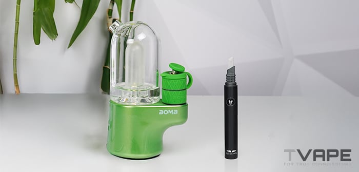Bomb Magloud E Rig is shown with the Utillian Hot Wax Axe - a dabbing tool, used for the easy concentrate loading