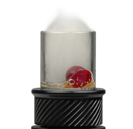 Glass chamber with red terp pearl and concentrate inside vaporiser atomizer