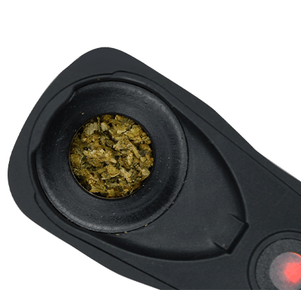 Vaporiser heating chamber filled with ground dry herb